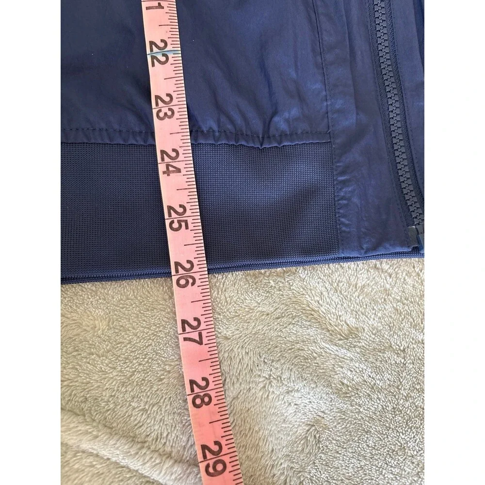 Women's Nike windbreaker rain jacket navy blue pockets Athletic sportswear NWOT